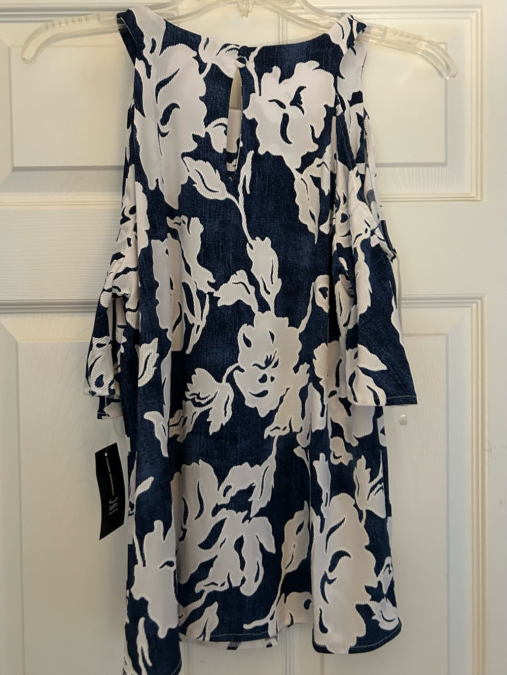Navy and White Floral INC Shoulder cut out shirt